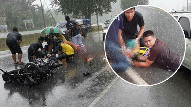 "หนุ่มกู้ภัยเมืองคอน" ทุ่มสุดตัว! นอนราบตากฝนกลางถนน ช่วยชีวิตผู้ประสบเหตุรถชน