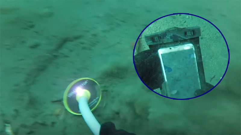 หนุ่มใช้เครื่องตรวจจับโลหะใต้น้ำ เซอร์ไพรส์เจอ iPhone ด่ำดิ่งรอคนมาเจอนานนับปี (คลิป)